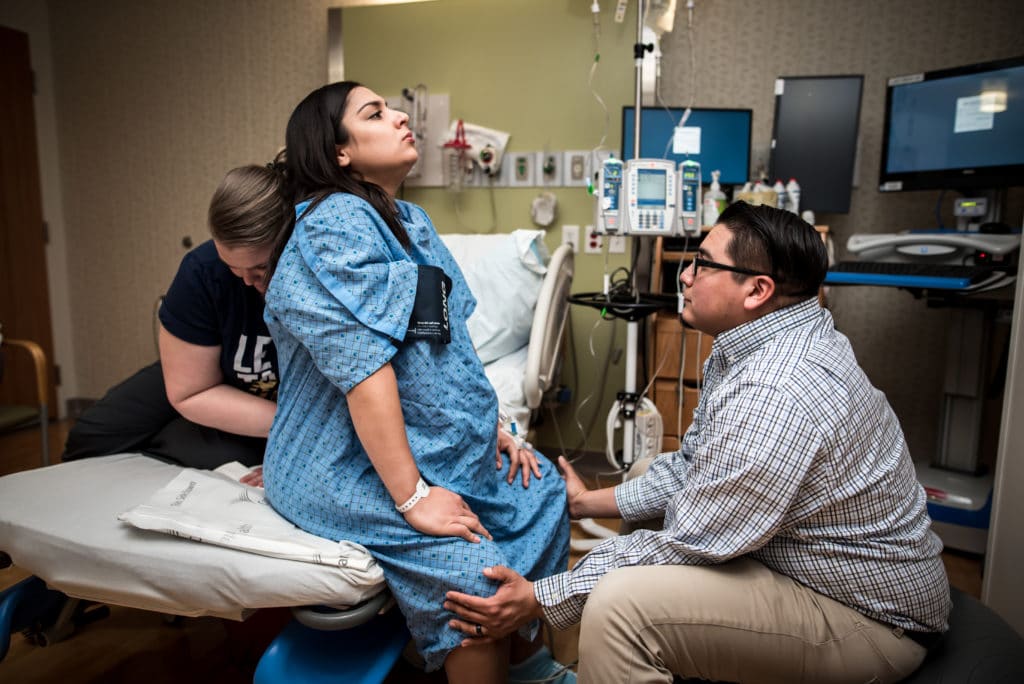 pregnant woman in hospital room prior to giving birth