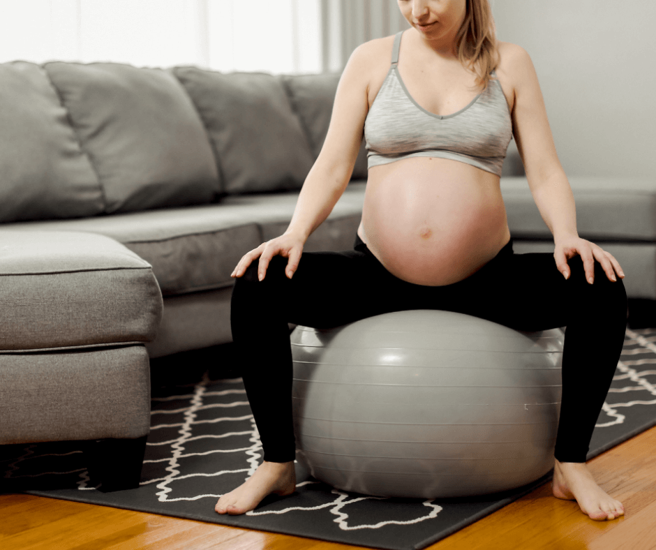 woman stimulating labor with a yoga ball